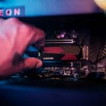 a hand holding a device