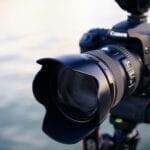 shallow focus photography of black Canon DSLR camera