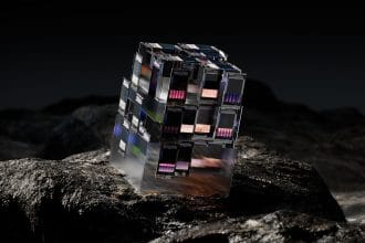 a cube shaped building on a rock