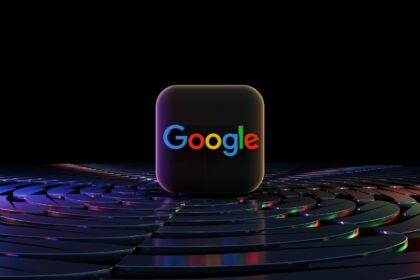 a close up of a computer keyboard with the word google on it