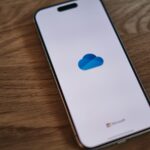 A close up of a cell phone on a table