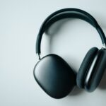 black wireless headphones on white desk