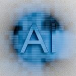 The letters ai are displayed on a blurred background.